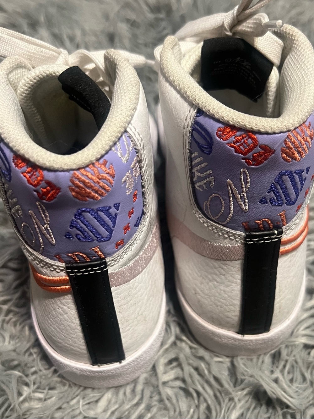 Nike Kids White High-Top Sneakers with Purple & Orange Embroidery